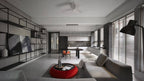 Wide open-plan room with a grey sofa and a red pouffe, with small Clérachic pendants just visible over the far dining table.