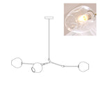 Outline of the 3-head Clérachic chandelier on white, paired with a small photo of a lit clear glass globe, a second view of the same drawing.