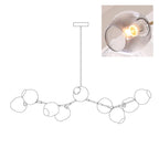 Diagram of this Clérachic chandelier with 9 heads, with a small inset of one gradient grey globe lit from within.