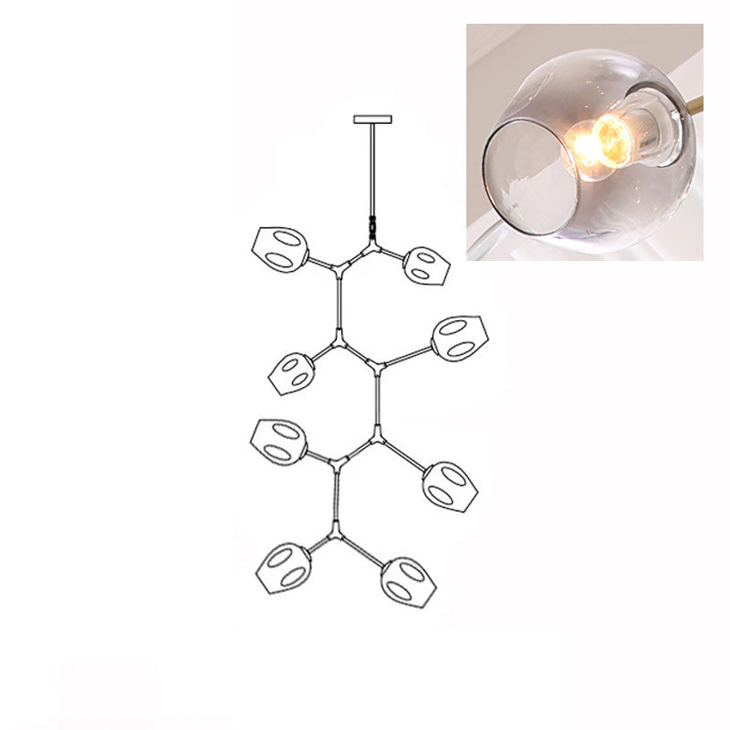 A lit, smoky grey glass globe in a close inset, next to the outline drawing of this 8-head Clérachic chandelier.