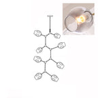A lit, smoky grey glass globe in a close inset, next to the outline drawing of this 8-head Clérachic chandelier.