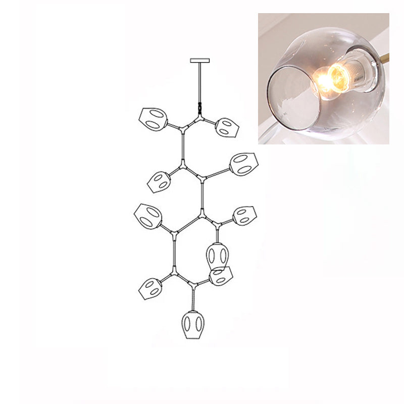 A lit, smoky grey glass globe in a close inset, next to the outline drawing of this 10-head Clérachic chandelier.