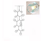 Clérachic 12-head chandelier drawn in outline, with a close-up inset of a lit gradient blue glass globe.