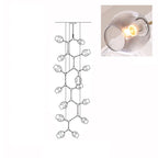 A lit, smoky grey glass globe in a close inset, next to the outline drawing of this 15-head Clérachic chandelier.