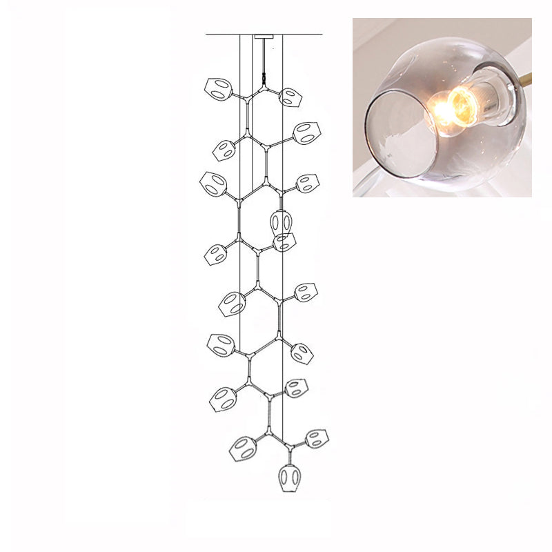A lit, smoky grey glass globe in a close inset, next to the outline drawing of this 18-head Clérachic chandelier.