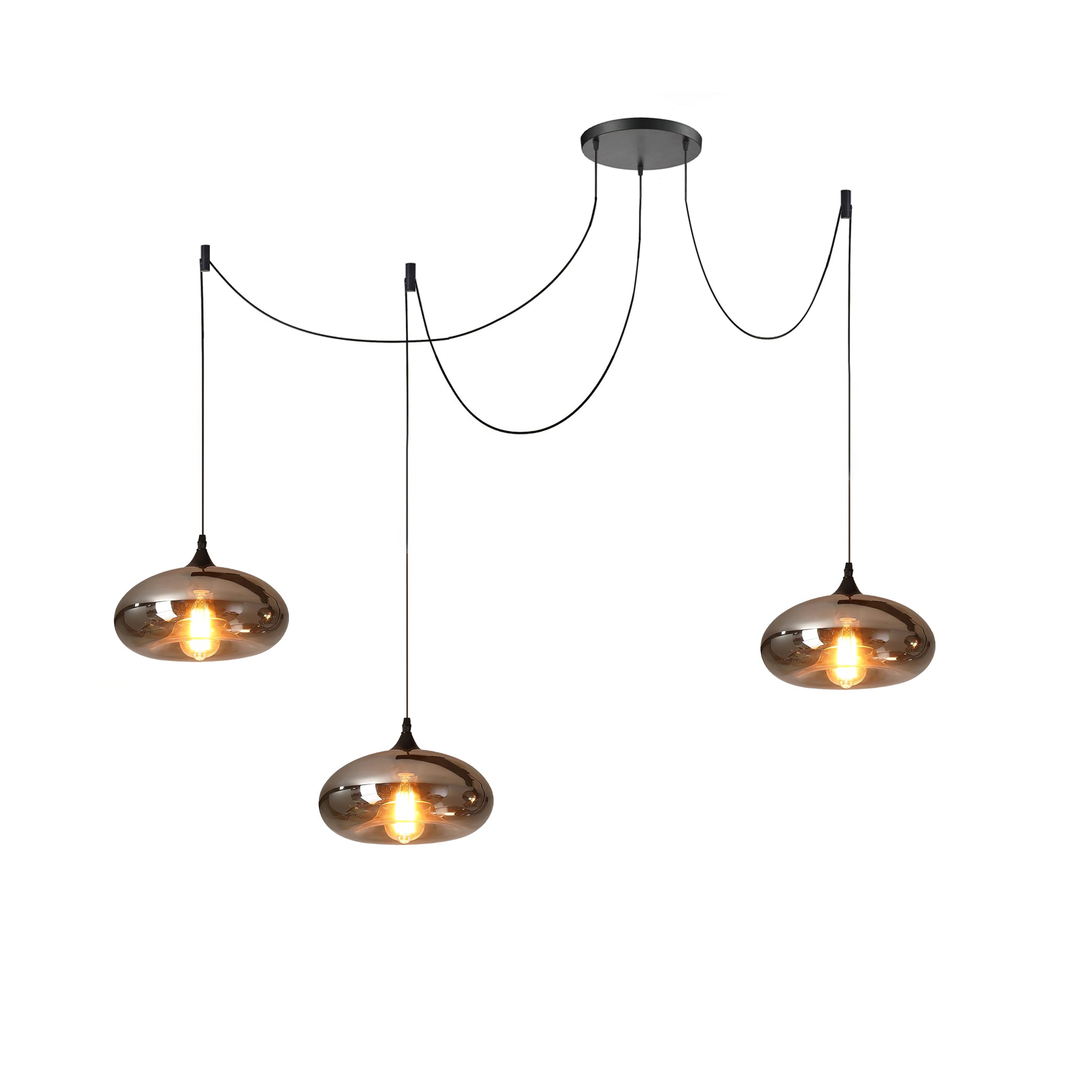 Three flattened disc Clérachic smoked glass pendants on one black spider canopy, cords swagged to separate hooks.