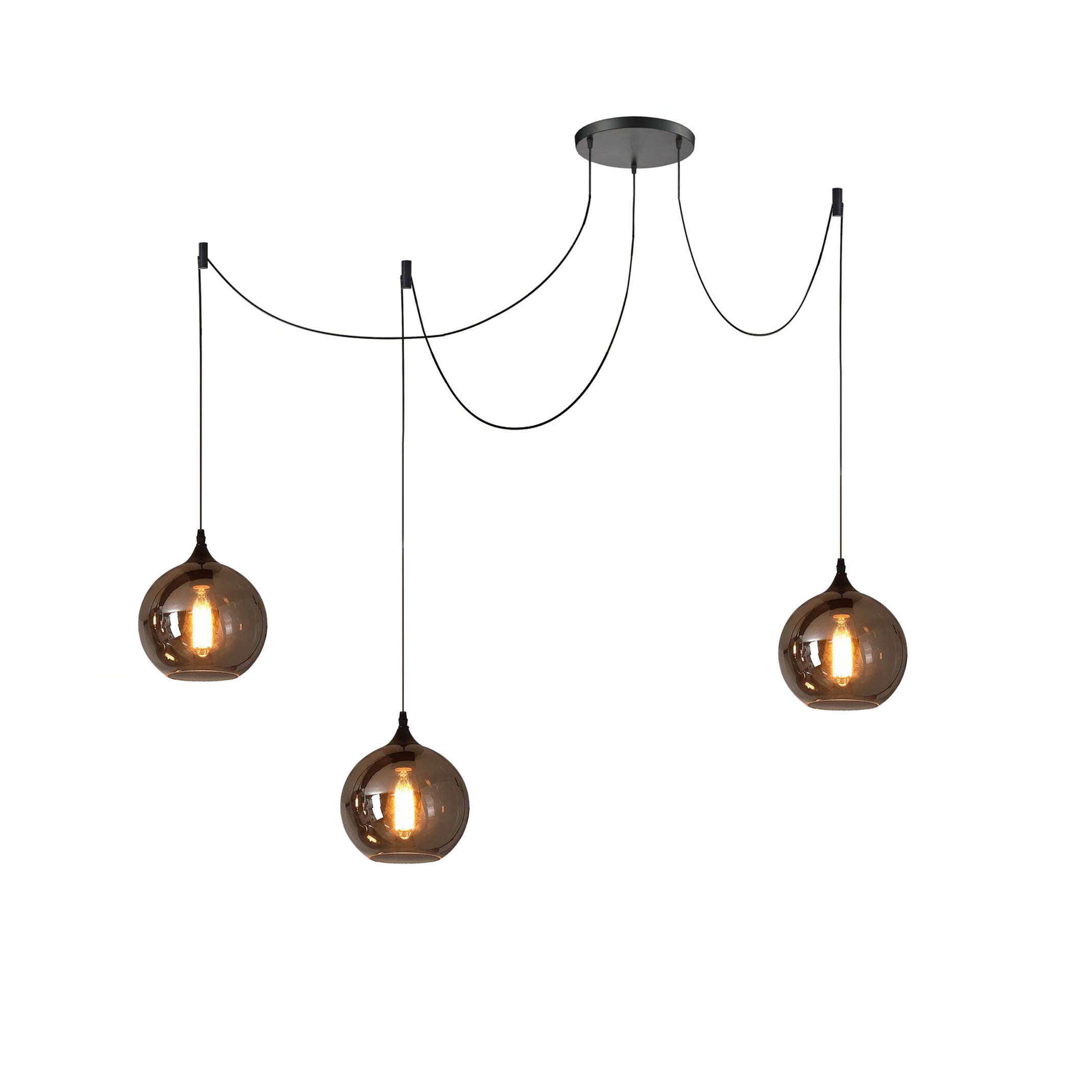 Three globe Clérachic smoked glass pendants from a single spider canopy, cords fanning out to three drop points.