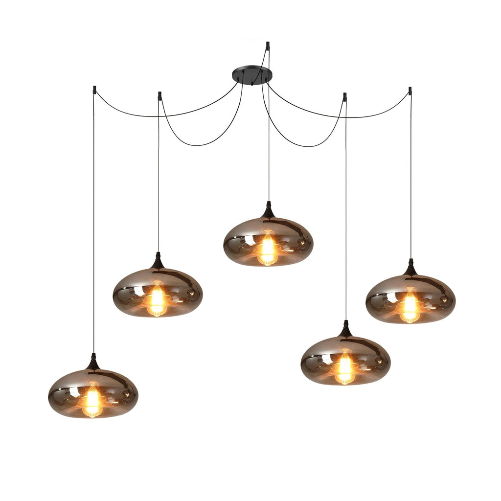 Five flattened disc Clérachic smoked glass pendants staggered across a spider canopy for a wide table run.