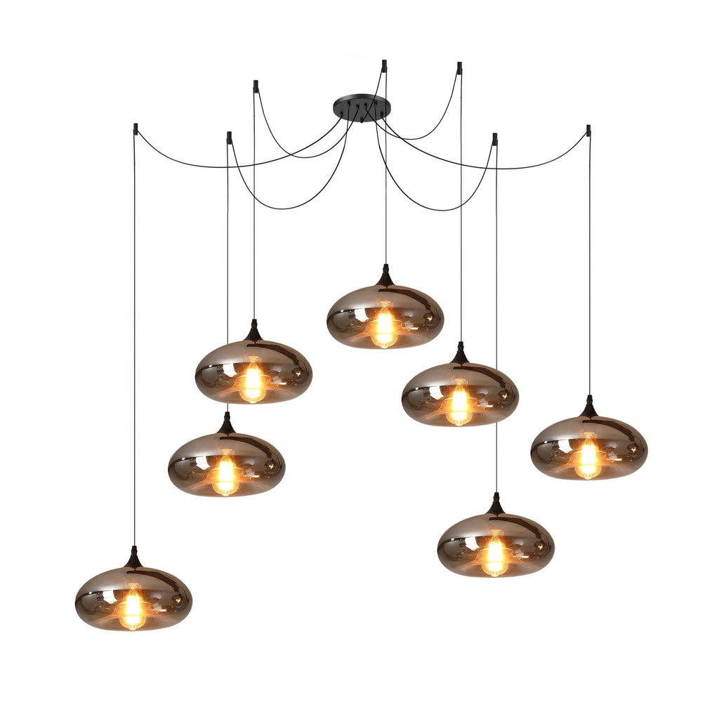 Seven flattened disc Clérachic smoked glass pendants spread from one spider canopy across a wide span.
