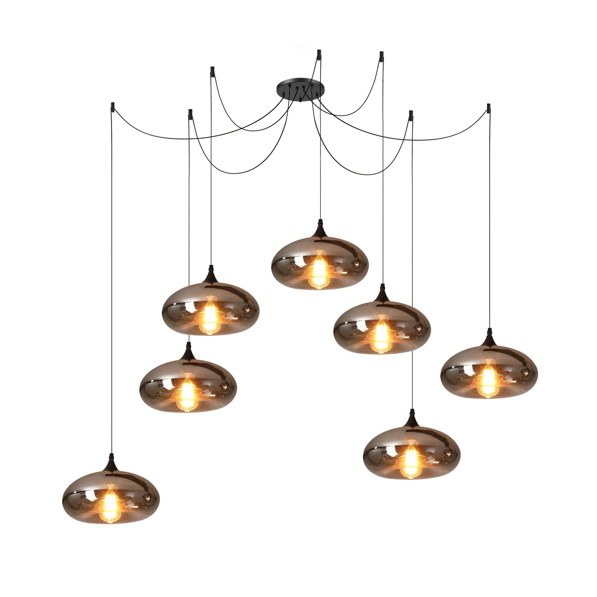 Seven flattened disc Clérachic smoked glass pendants spread from one spider canopy across a wide span.