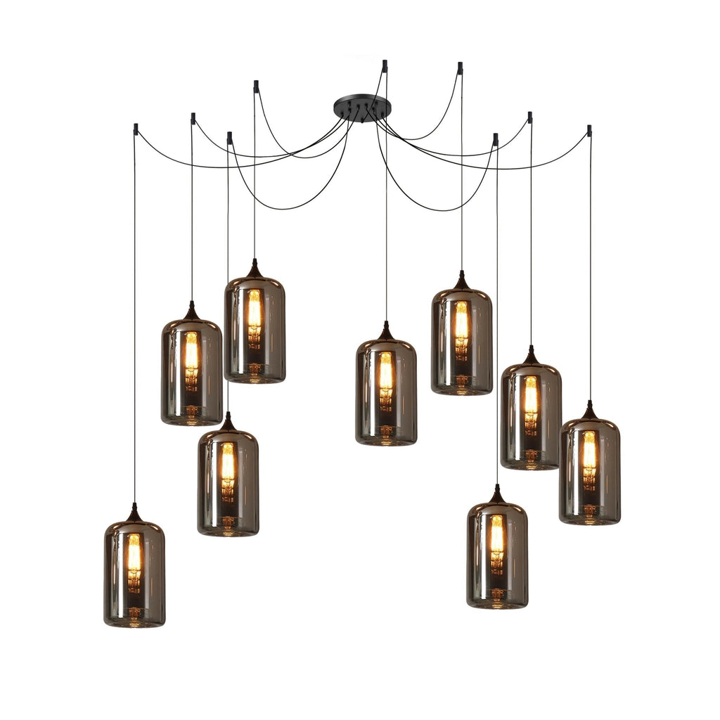 Nine cylindrical Clérachic smoked glass pendants hung in a deep cluster from a single round canopy.