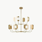 A champagne-gold Clérachic chandelier on a rod, two tiers of curved arms holding leaf shades and white globes on a pale backdrop.