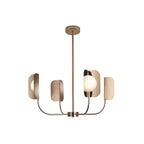 A copper Clérachic chandelier on a rod, four arms holding leaf shades and a lit globe, shown on a plain white backdrop.