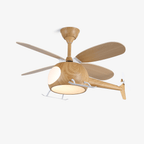 Helicopter-shaped ceiling fan with light from Clérachic, with wood-grain blades, body and white landing skids, on a plain white backdrop.