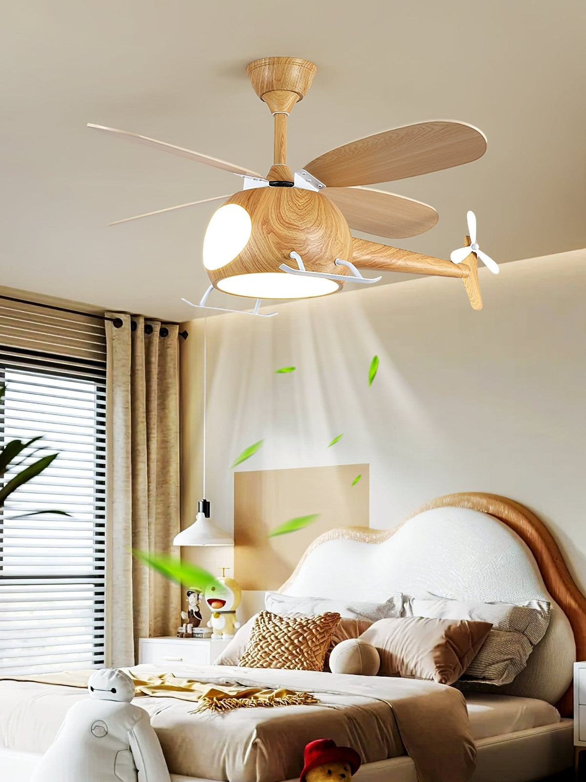 Over a bed with a curved headboard, this Clérachic wood-grain helicopter fan shows its airflow as leaves, beside a window with blinds.