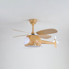 On a light grey ceiling, this wood-grain Clérachic helicopter fan has its cabin light on and white landing skids below.