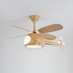 A warm light glows under the cabin of this wood-grain Clérachic helicopter fan on a pale grey ceiling.