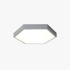Angled studio view of the gray Clérachic hexagon LED flush mount ceiling light on a white background.
