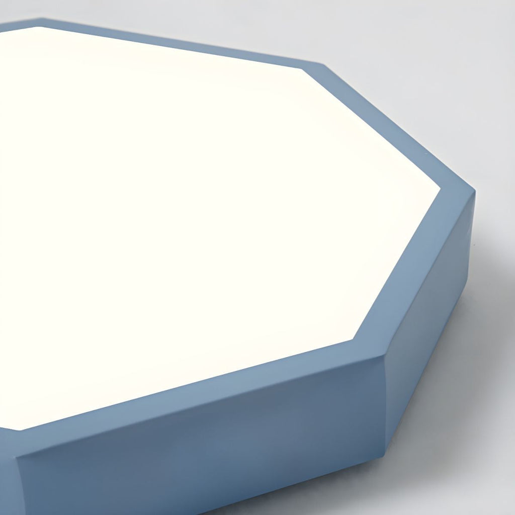 Close-up of the blue-gray Clérachic hexagon ceiling light's beveled corner and acrylic diffuser panel.