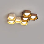 Eight-cell Clérachic ceiling light split into two clusters, travertine on the left and walnut-toned cells on the right.