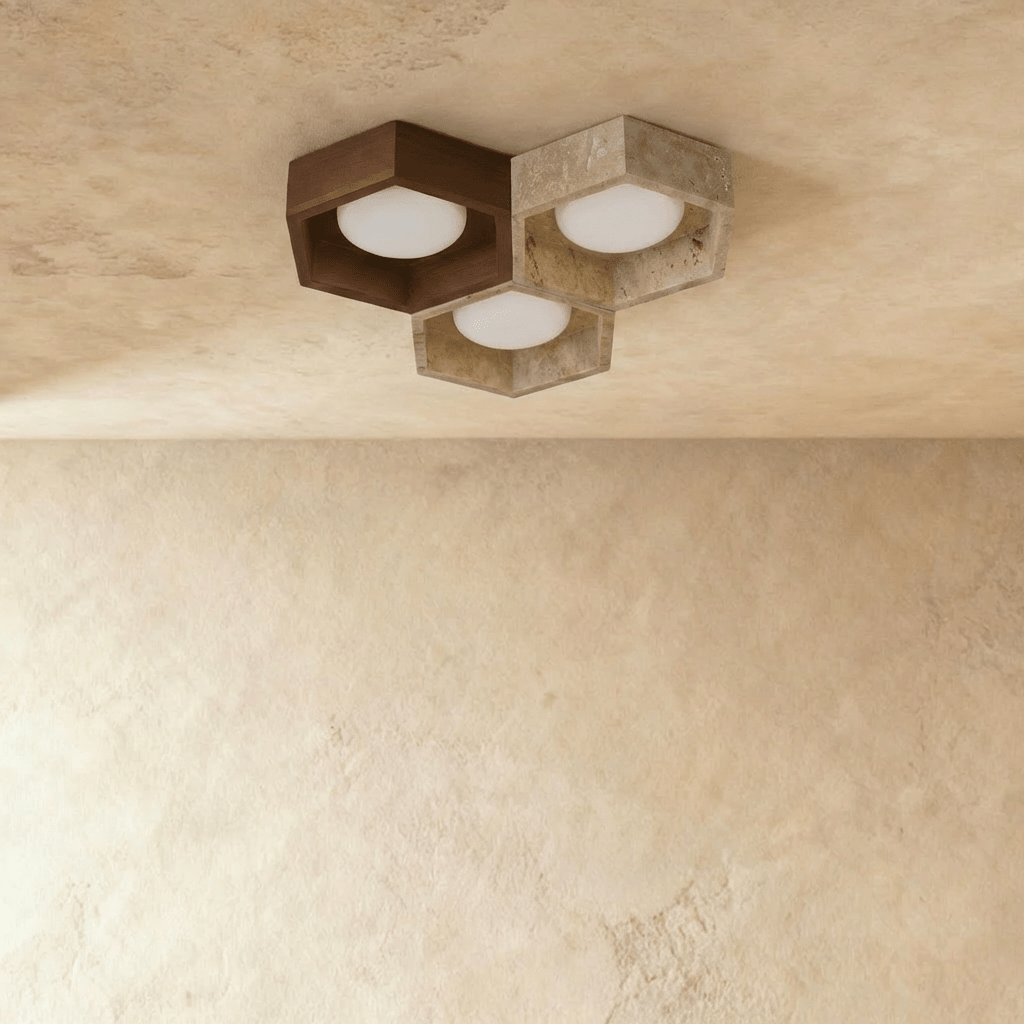 Clérachic three-head hexagonal ceiling light in walnut and pale travertine, switched off, opal glass globes in each frame.