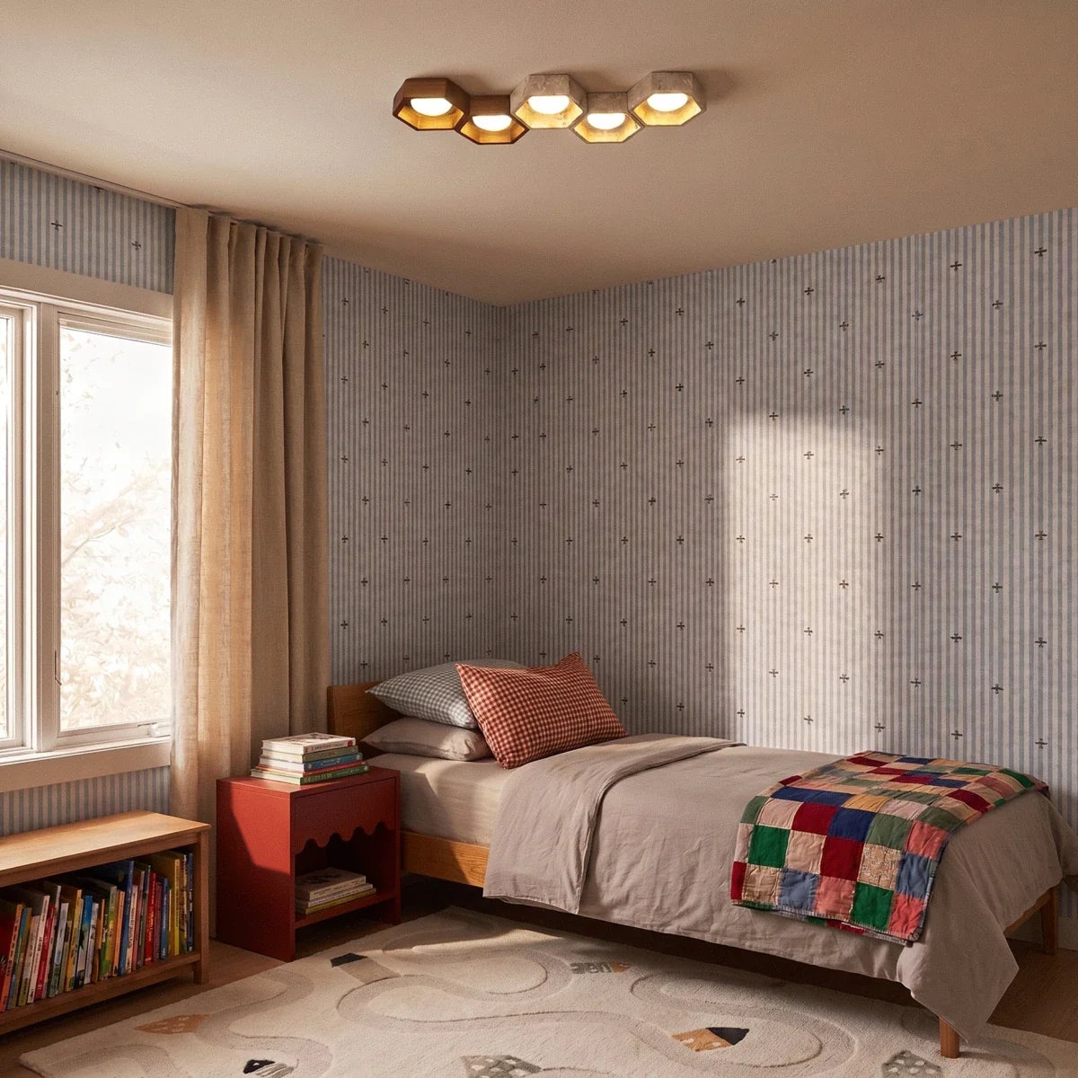 Clérachic five-head hexagonal ceiling light lit above a child’s bedroom with striped wallpaper, a red bedside table and a patchwork quilt.