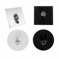 Clérachic stair light finishes side by side: brushed silver square, black square, white round and black round, on white.