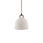 A sand-coloured Clérachic bell pendant with a brown cord, shown on a plain white backdrop.