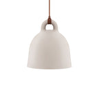 A small sand-coloured Clérachic bell pendant with a brown cord, shown on a plain white backdrop.