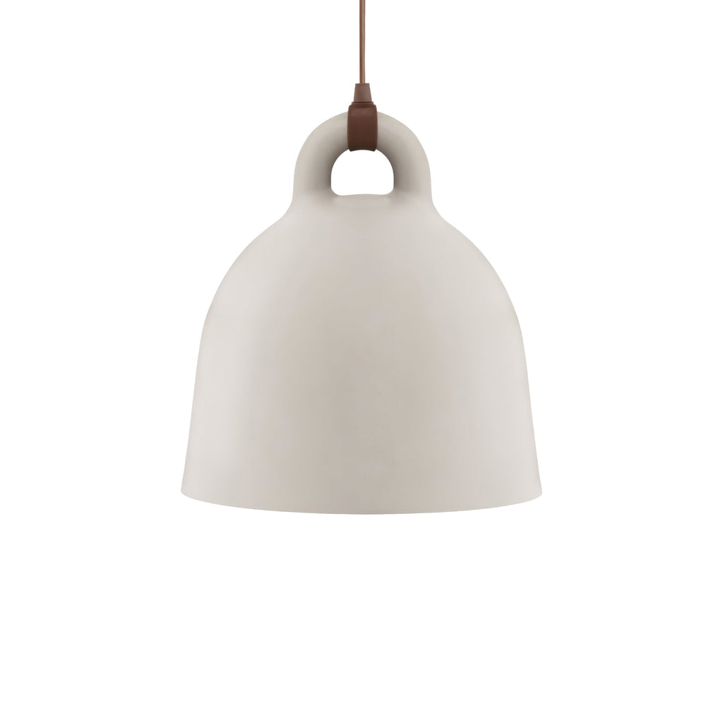 A medium sand-coloured Clérachic bell pendant with a brown cord and loop handle, on a plain white backdrop.