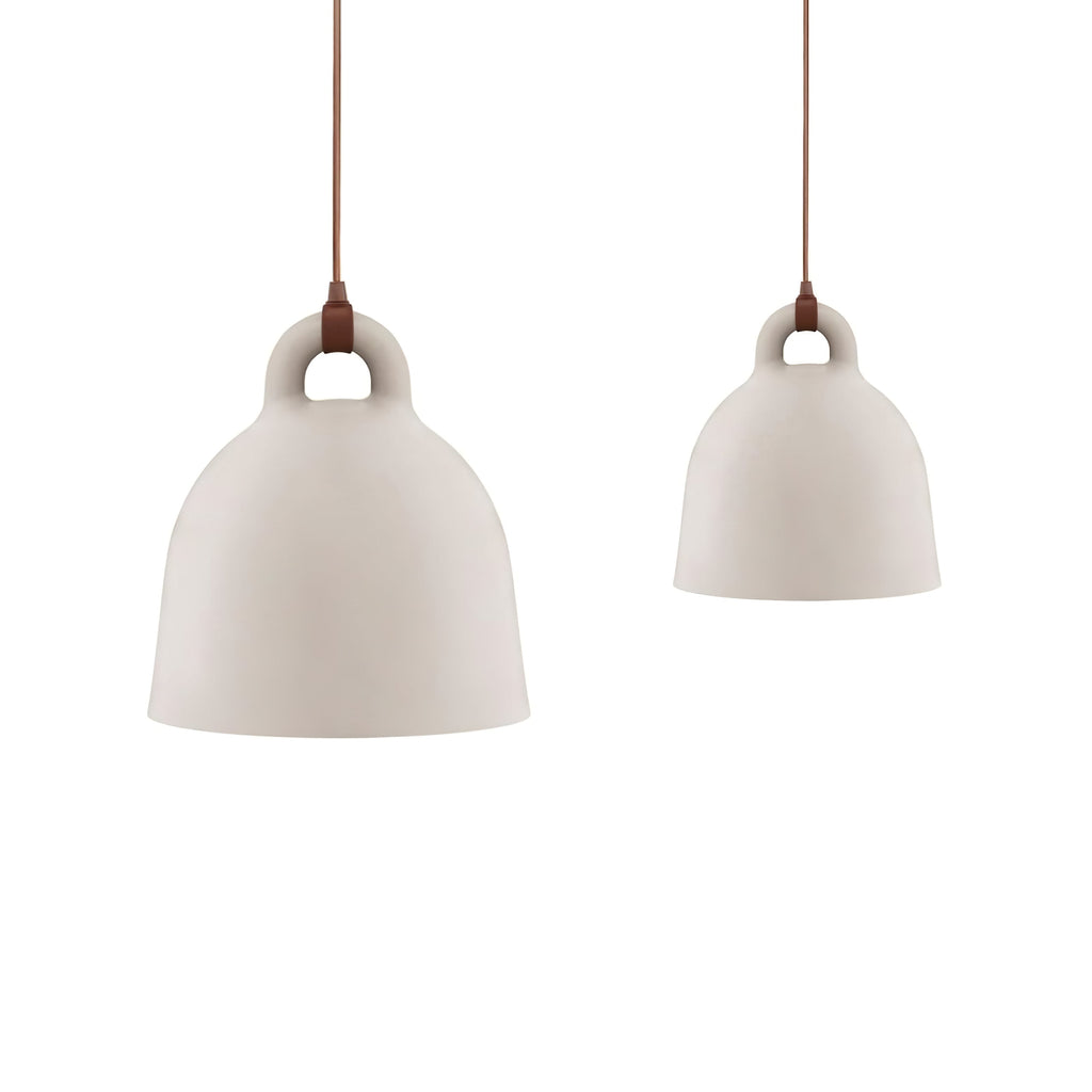 Two sand-coloured Clérachic bell pendants in different sizes, with brown cords, on a plain white backdrop.