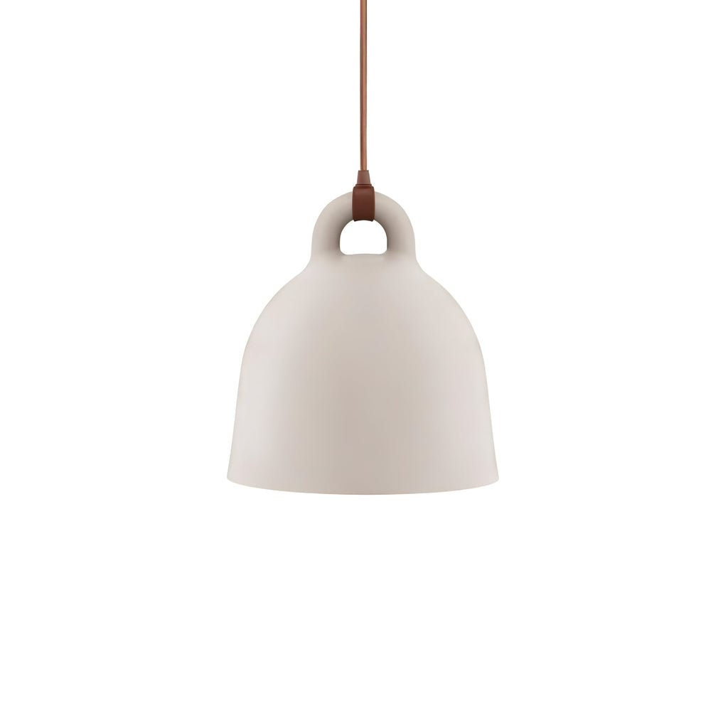 A small sand-coloured Clérachic bell pendant with a brown cord, hanging on a plain white backdrop.