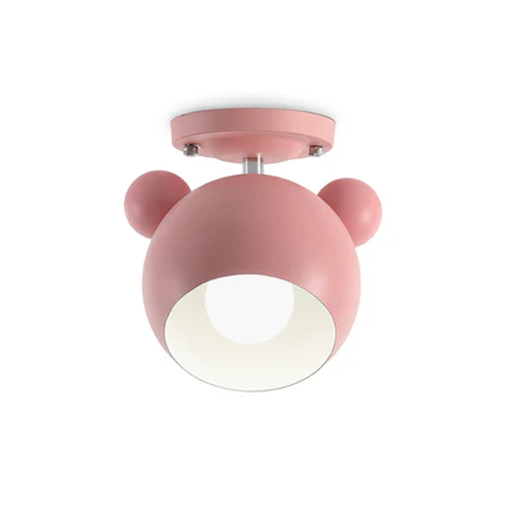 Closer view of the pink Clérachic ceiling lamp, its white-lined dome and round ear details sitting under a flat ceiling plate.
