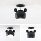 Three views of a black Clérachic ceiling lamp with round ears: one large angled shot and two smaller ones below.