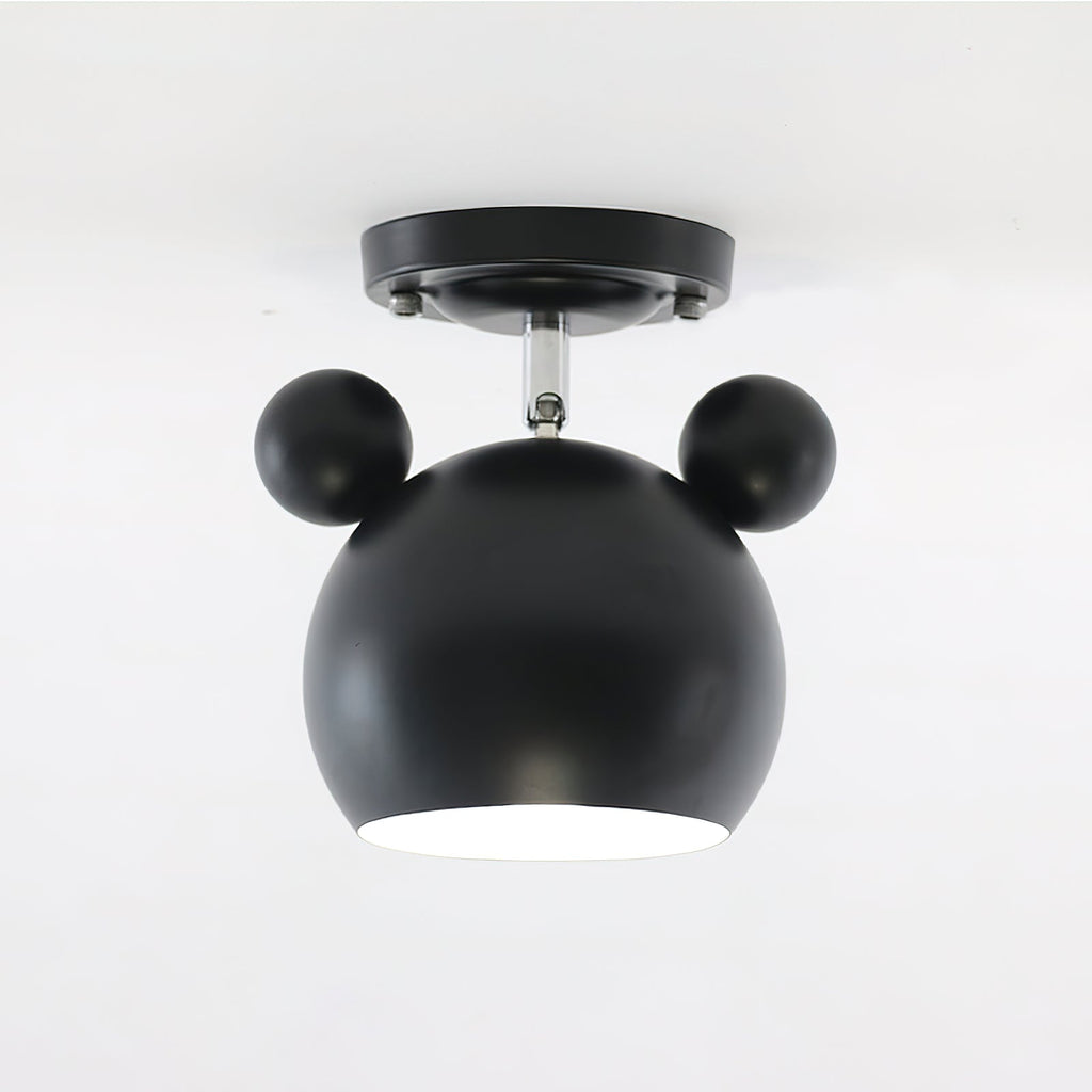 Matt black Clérachic ceiling lamp with round ears, a short stem and a flat black ceiling plate.
