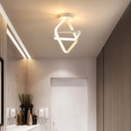Clérachic white interlocked-diamond ceiling light glowing warm in a narrow hallway with timber panelling and a white door.