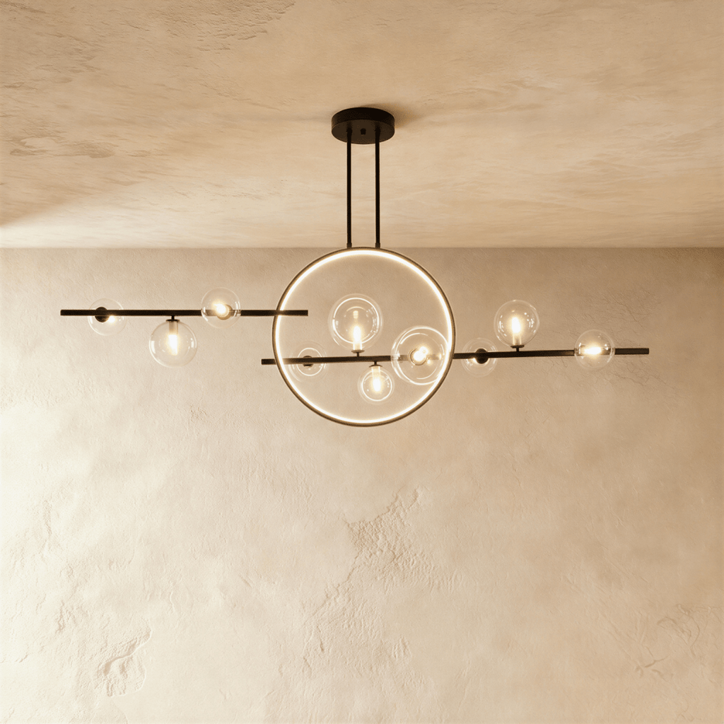 Clérachic's matte black iron chandelier pairs a slender ring with clear glass globe bulbs along a horizontal ceiling bar.