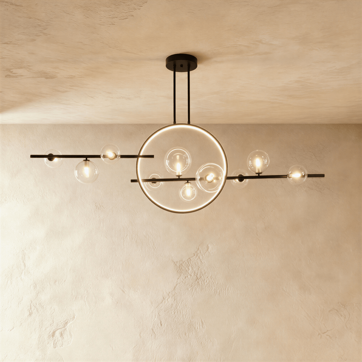 Clérachic's matte black iron chandelier pairs a slender ring with clear glass globe bulbs along a horizontal ceiling bar.