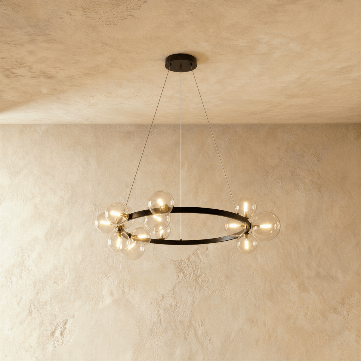 This large Clérachic ring chandelier rings clear glass globe bulbs around its full black circumference on two cables.