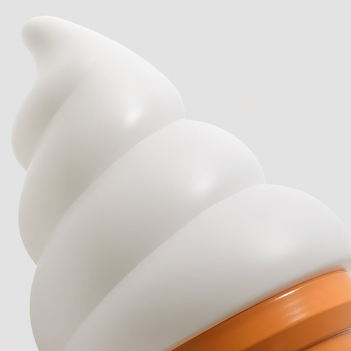 Close view of the white swirled shade on this Clérachic wall light, where it sits against the rim of the orange cone.