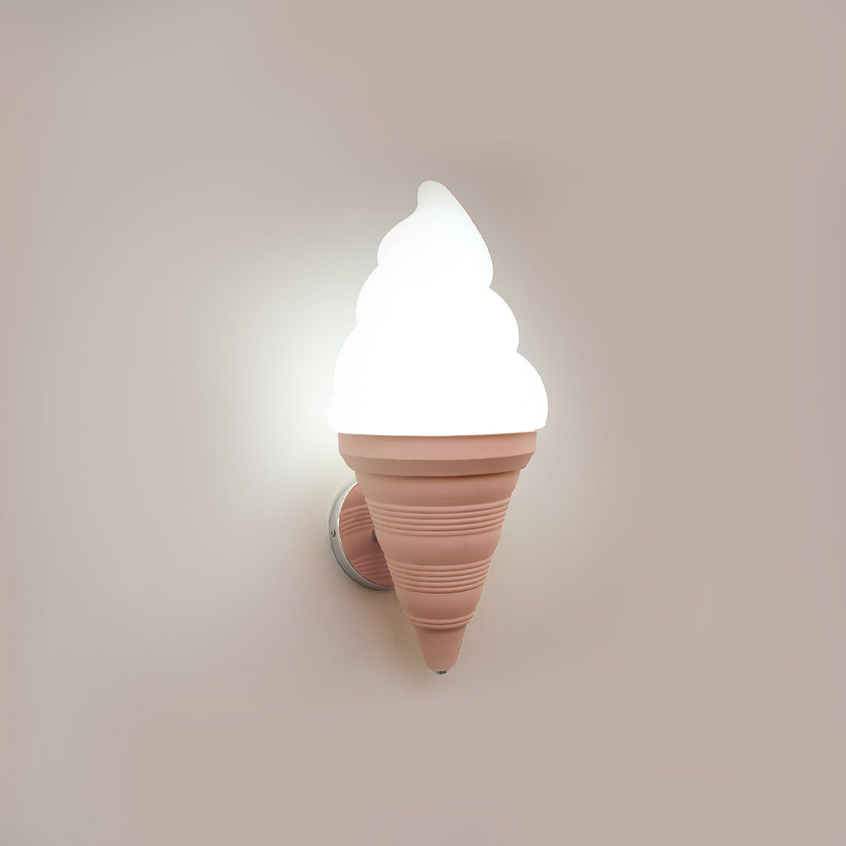 Pink-coned Clérachic wall light lit in cool white against a pale mauve wall, with the swirl shade bright above the ribbed cone.