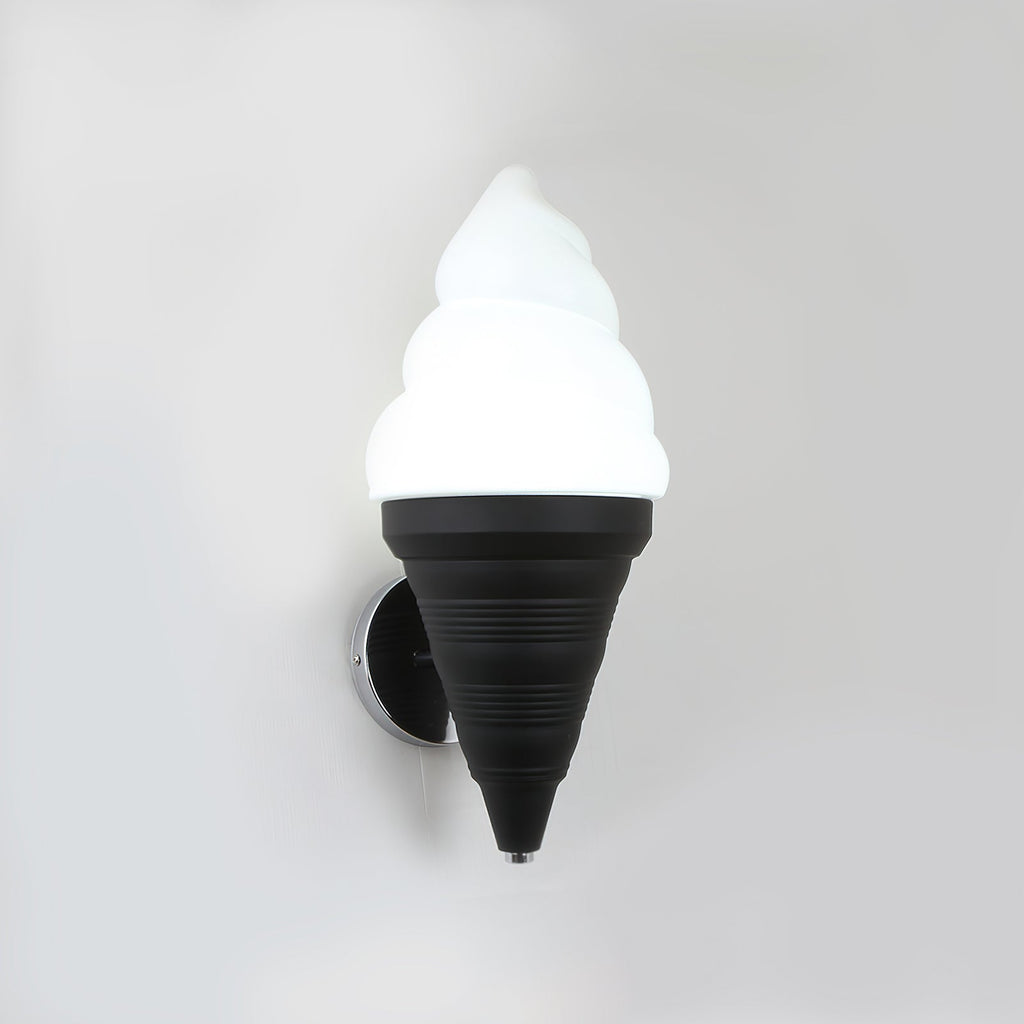 Black-coned Clérachic wall light lit in cool white on a light grey wall, the swirl shade bright above a ribbed cone and chrome backplate.