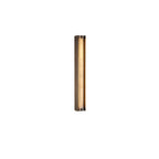 Clérachic Isolde alabaster wall sconce shown unlit on white, its slim bronze channel framing a narrow stone tube.