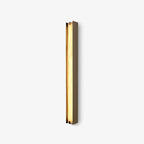 Clérachic Isolde angled on a pale backdrop, showing the depth of the bronze channel beside the lit stone face.