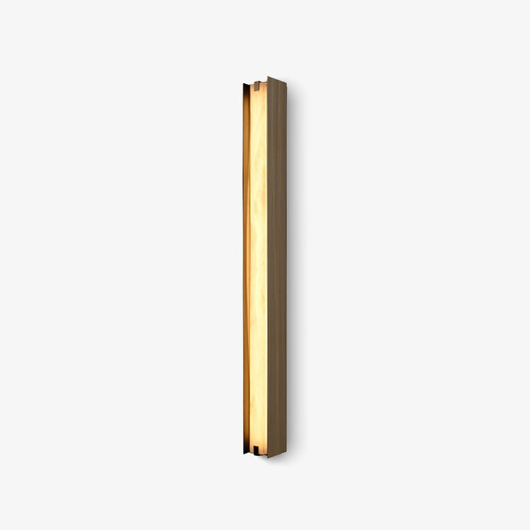 Clérachic Isolde angled on a pale backdrop, showing the depth of the bronze channel beside the lit stone face.