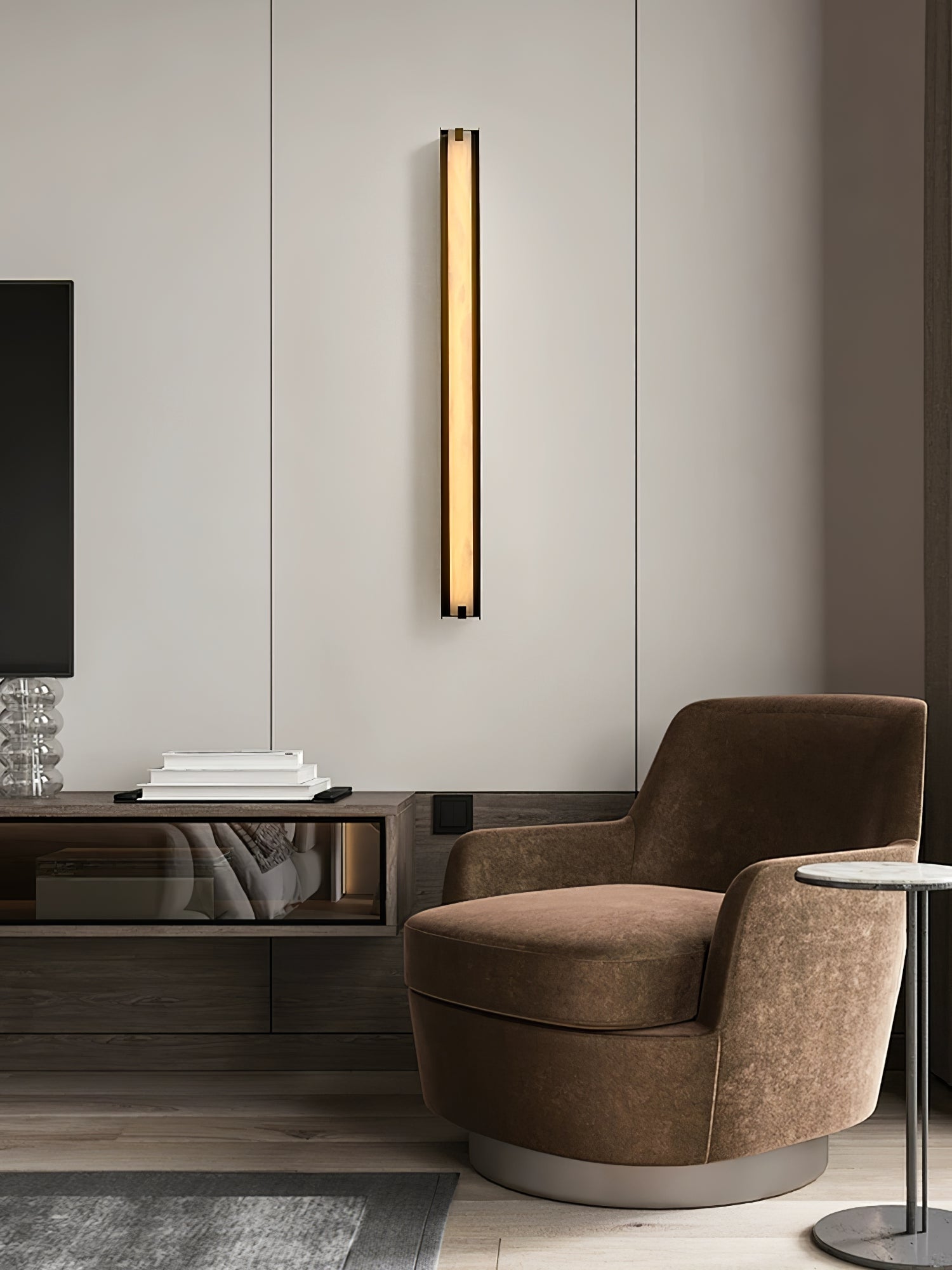 The Clérachic Isolde on a panelled living-room wall above a console, next to a brown swivel armchair.