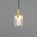 Slightly wider U-shaped Clérachic pendant, with its glass edge catching the light above a frosted liner, on a grey backdrop.