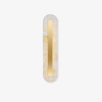 Clérachic Kristy wall lamp on white, showing the full oval profile and brass inset.
