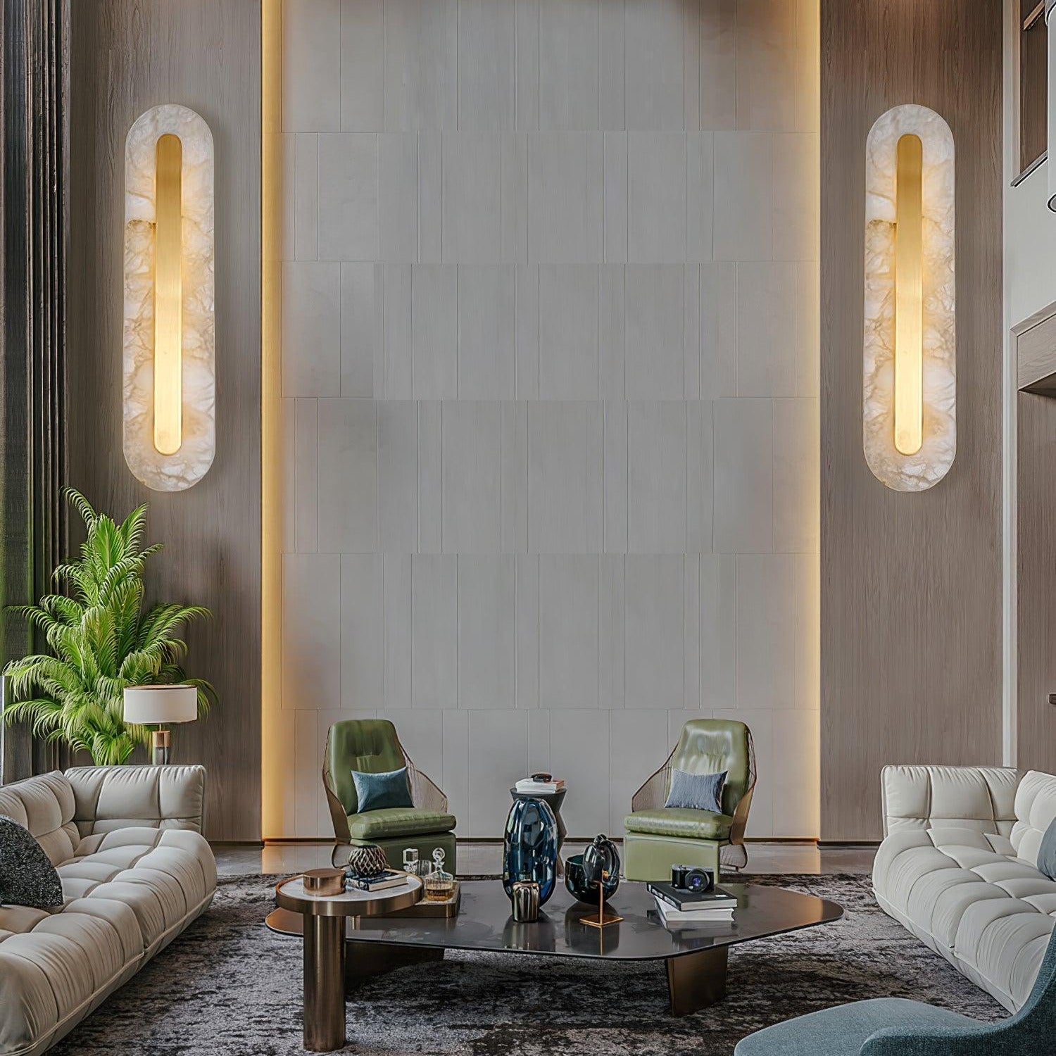Clérachic Kristy wall lamps either side of a lounge seating area with a marble backdrop.