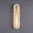 Clérachic Kristy wall lamp on grey with heavier veining running through the alabaster.